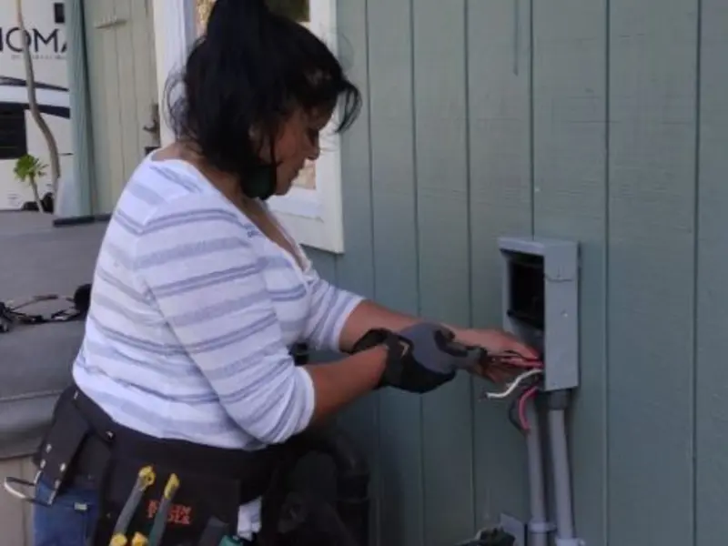 Licensed electrician wiring an exterior subpanel in Star